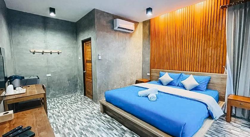 ห้องพักพร้อมเตียงติดทะเลที่โรงแรมไซ่ง่อนในจังหวัดระยอง โรงแรมท่าศาลา