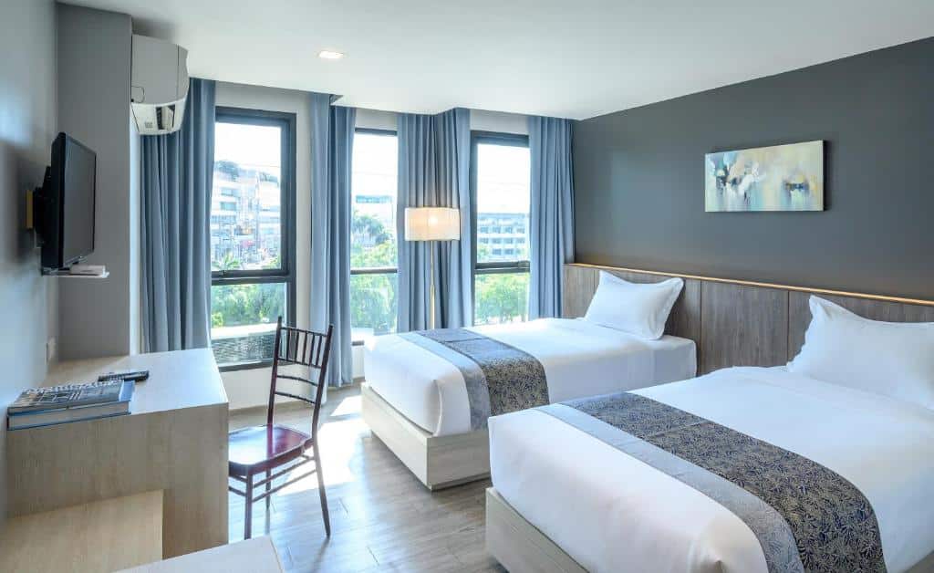 ห้องพักโรงแรม 2 เตียง และโทรทัศน์ ใกล้อิมแพคเมืองทองธานี ที่พักใกล้อิมแพคเมืองทองธานี