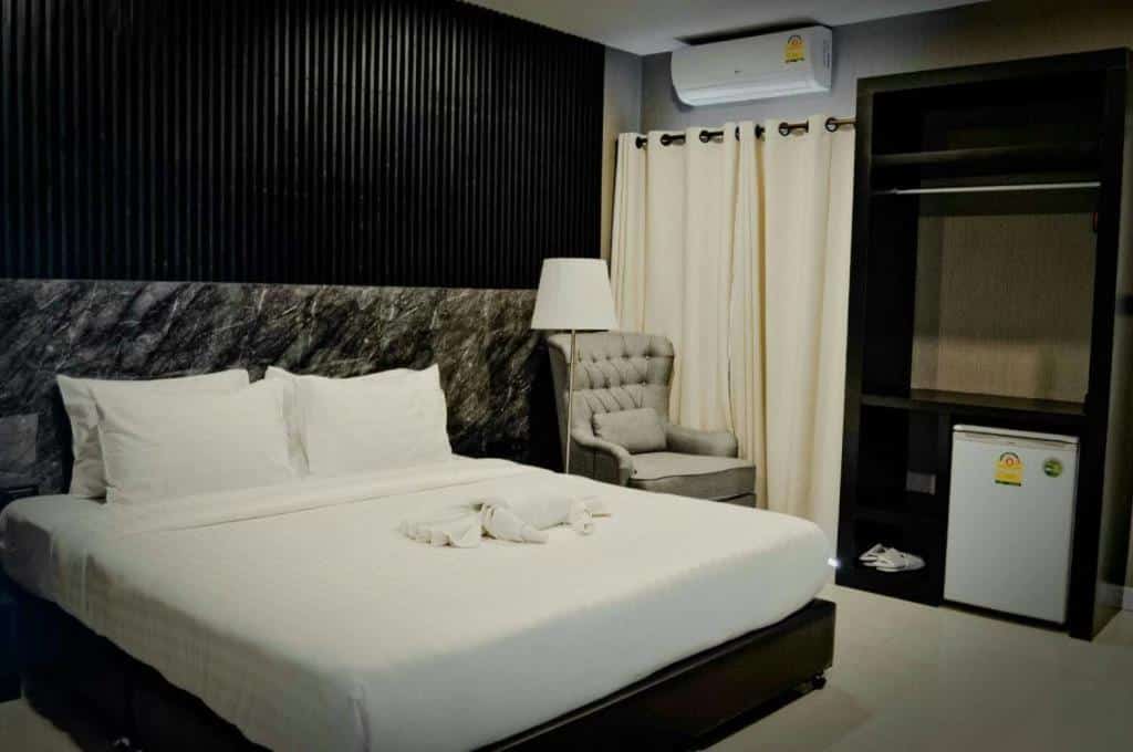 ที่พักลำปาง เตียงหรือเตียงของโรงแรมในกรุงเทพฯ ใกล้สถานที่ท่องเที่ยวของจังหวัดชลบุรี