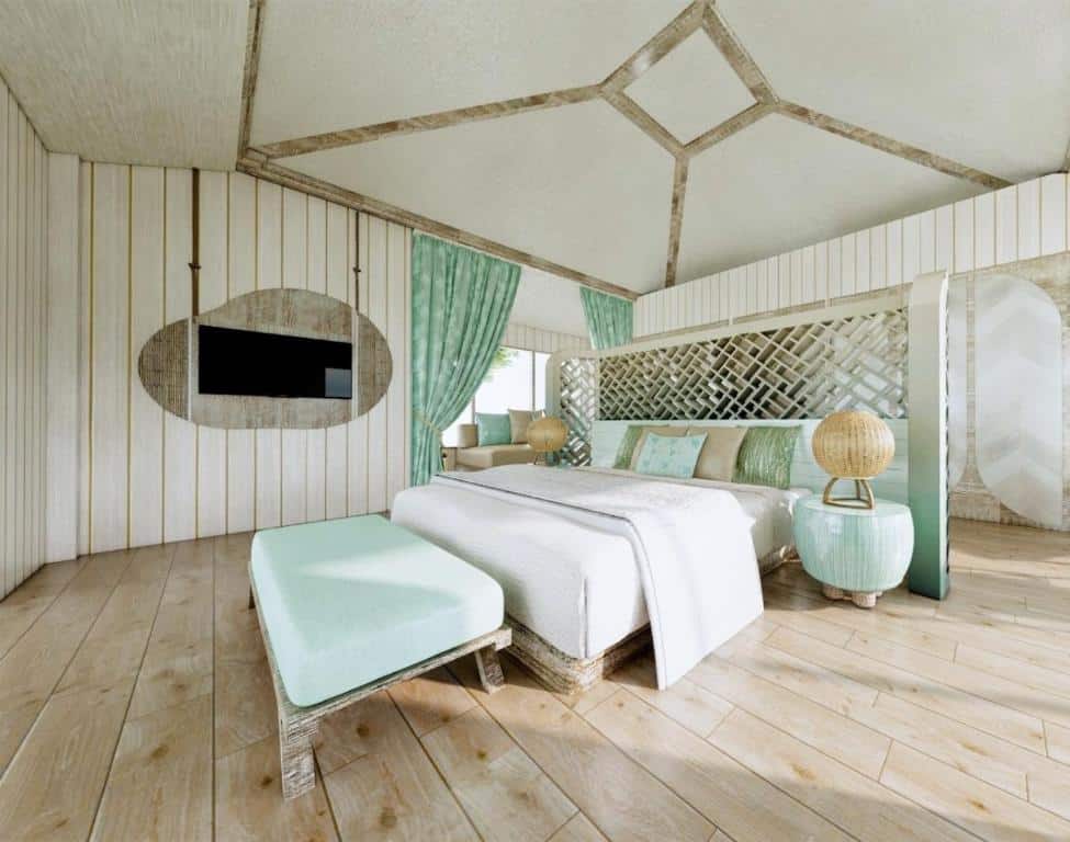 ที่พักเกาะกระดาน มีพื้นไม้และเตียงสีขาว