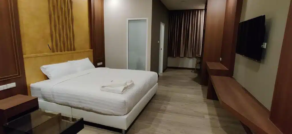 เตียงในห้อง ที่พักปทุมธานี โรงแรมในปทุมธานี