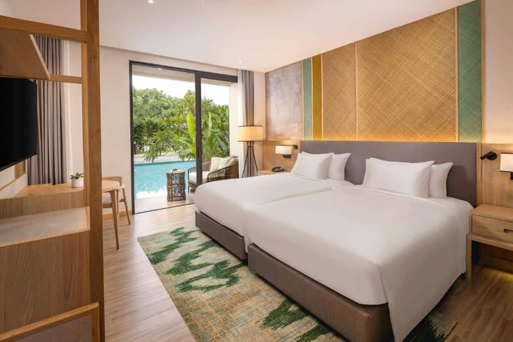 ห้องพักในโรงแรมแบบ 2 เตียงตั้งอยู่ใกล้ถนนคนเดินอันคึกคักของเชียงใหม่ มีสระว่ายน้ำที่สร้างความสดชื่น ที่เที่ยวพัทลุง