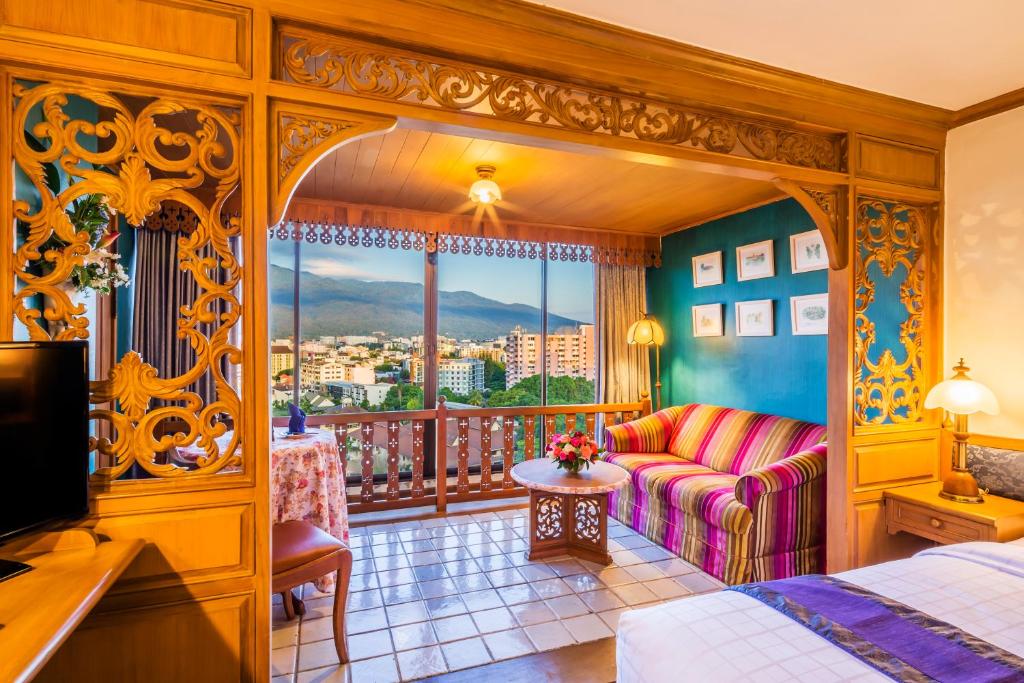 ห้องพักโรงแรมในเที่ยวราชบุรีพร้อมทิวทัศน์อันตระการตาของภูเขา ที่พักเชียงใหม่