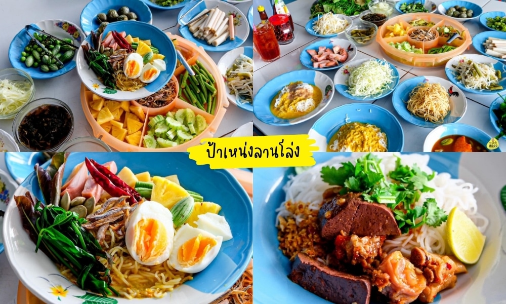 อาหารไทยหลากหลายประเภท เช่น บะหมี่ ไข่ และผัก ได้รับการจัดวางอย่างประณีต ร้านขนมจีนพังงา บนจานสีฟ้าที่ร้านร้านอาหารเมืองพังงา ทำให้เกิดประสบการณ์การทำอาหารที่น่ารื่นรมย์บนโต๊ะอาหาร.